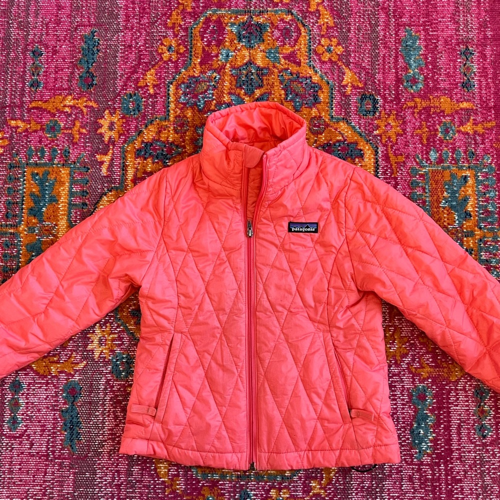 Pink Patagonia puffer jacket.